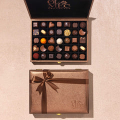 Bronze Suitcase Box Of 35