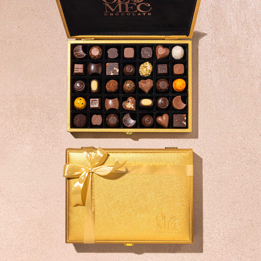 Gold Suitcase Box Of 35