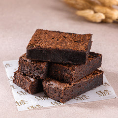 Rich fudgy American Brownie squares with glossy chocolate texture