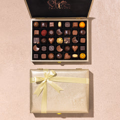 ⁠Rose Gold Suitcase Box Of 35